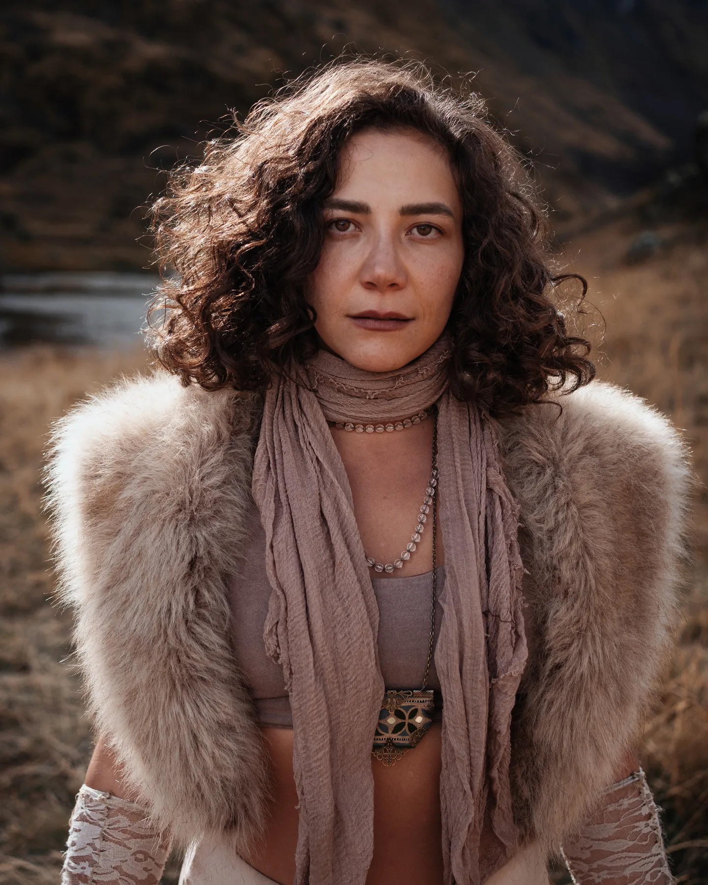 Portrait of Paras looking at the camera in a mountain valley